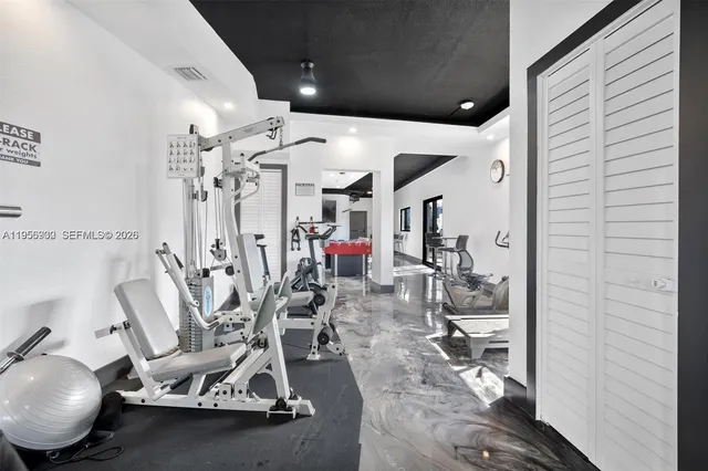 a view of a room with gym equipment