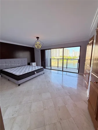 a lobby with furniture and window
