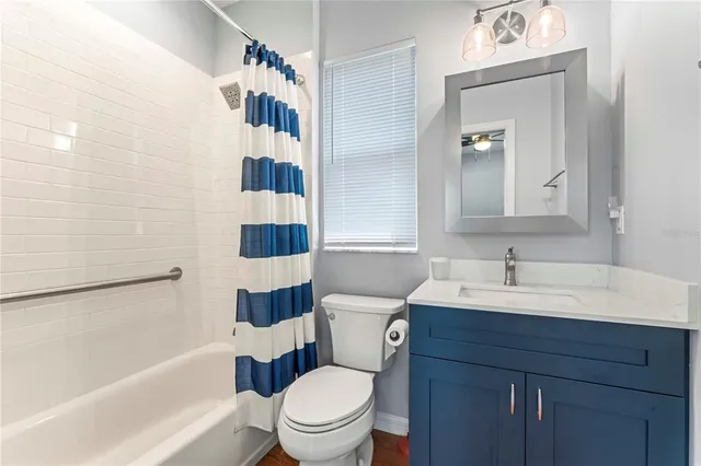 a bathroom with a sink a toilet and a bathtub