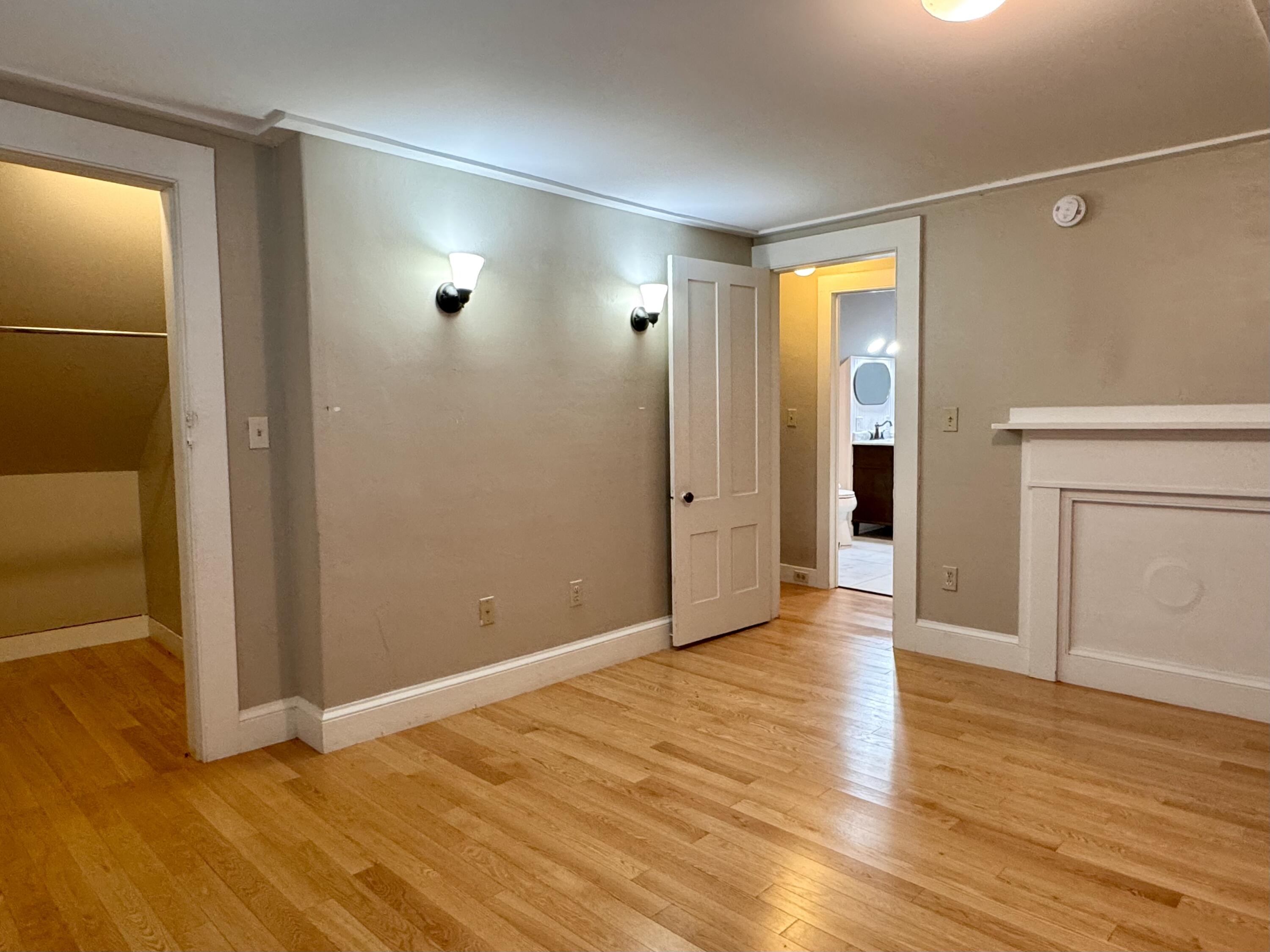 305 Main Street Waterville, ME 04901 - Photo 13 of 17 Primary bedroom with large walkin closet