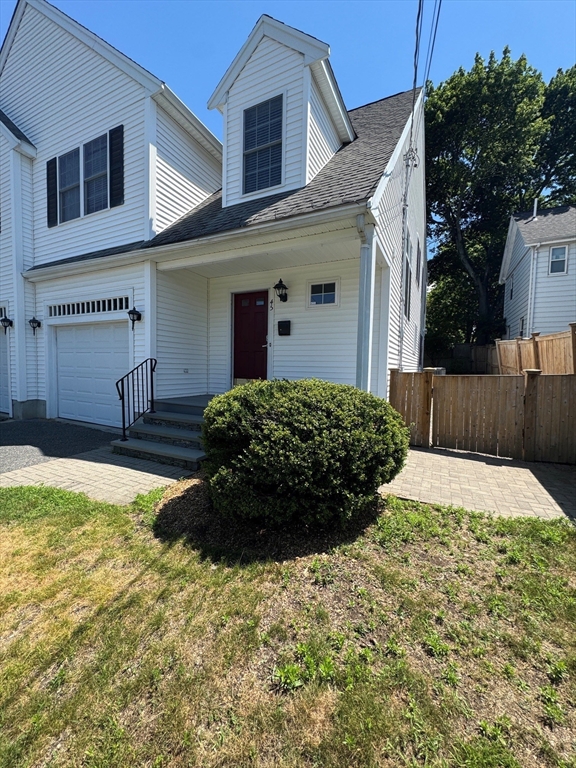 45 Crescent Road, Unit 45 Needham, MA 02494 - Photo 2 of 25 a view of a house with backyard and trees