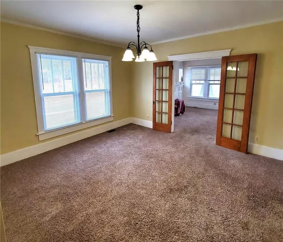 a view of an empty room with window