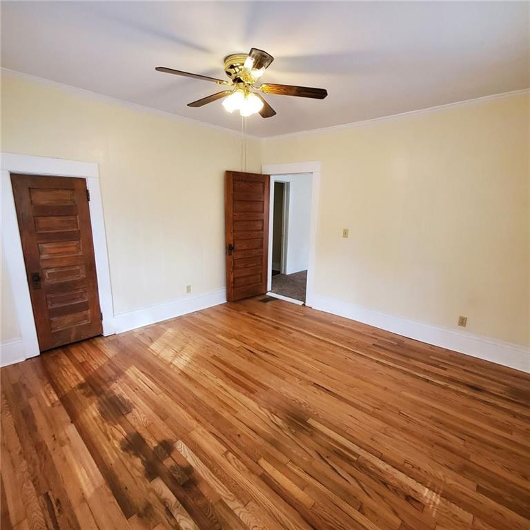 7025 Rico Road Chattahoochee Hills, GA 30268 - Photo 24 of 51 a view of empty room with wooden floor