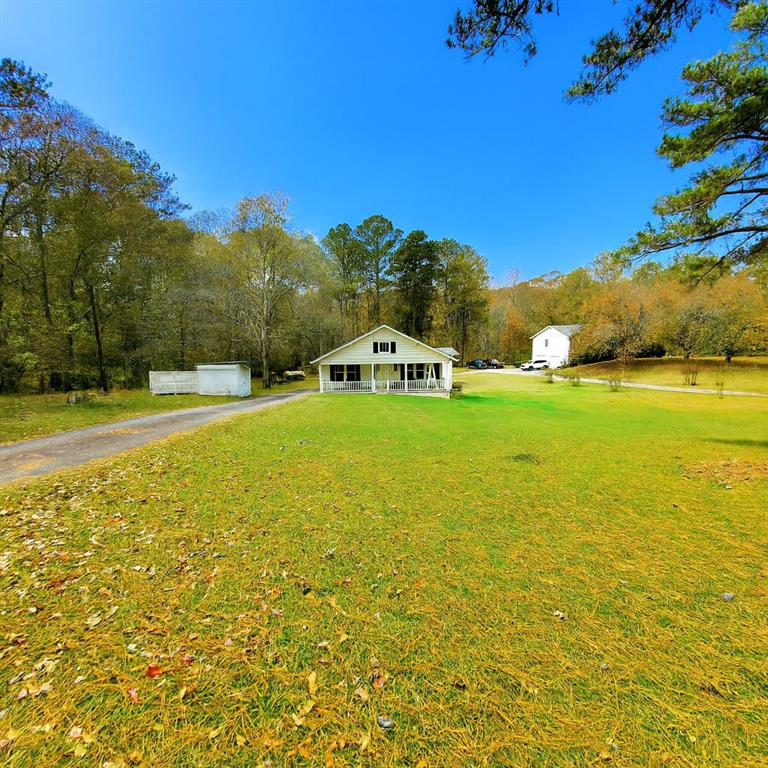7025 Rico Road Chattahoochee Hills, GA 30268 - Photo 3 of 51 a view of an ocean and beach