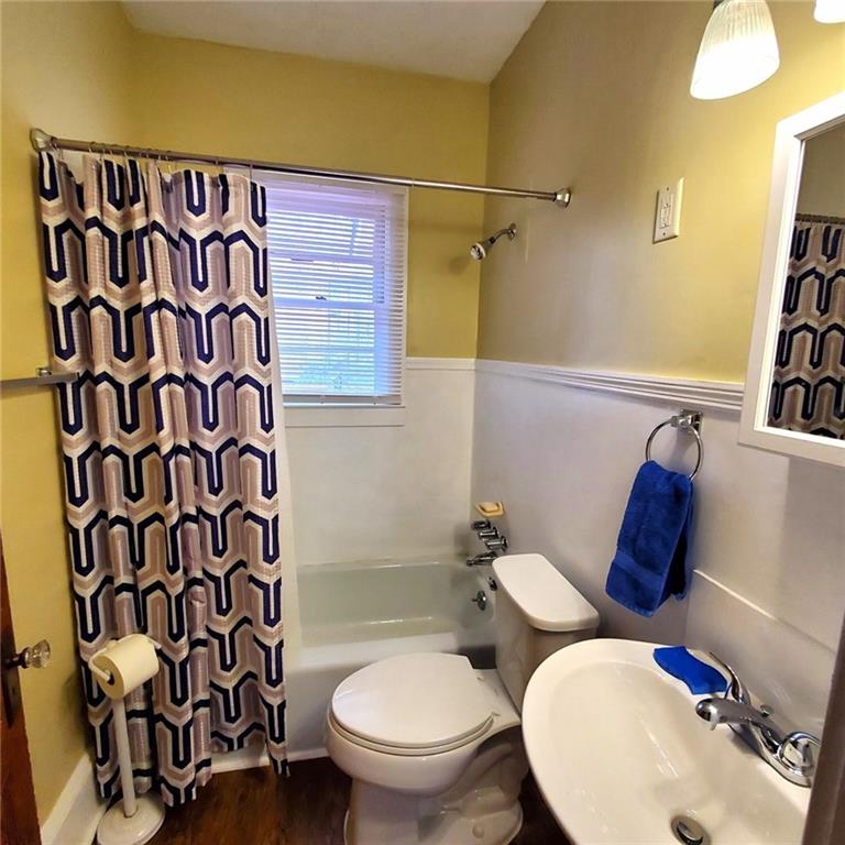 7025 Rico Road Chattahoochee Hills, GA 30268 - Photo 40 of 51 a bathroom with a toilet and a sink