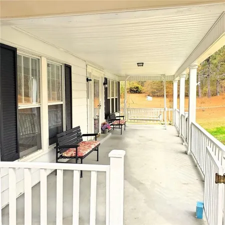 a living room with large windows