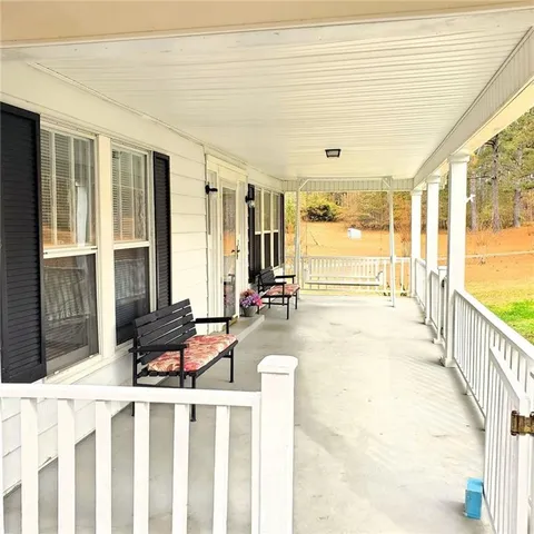 a living room with large windows