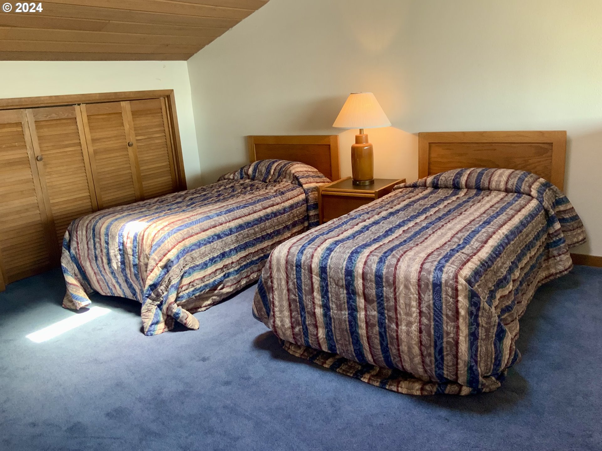 94304 Wedderburn Loop, Unit 429 Gold Beach, OR 97444 - Photo 17 of 19 Bedroom