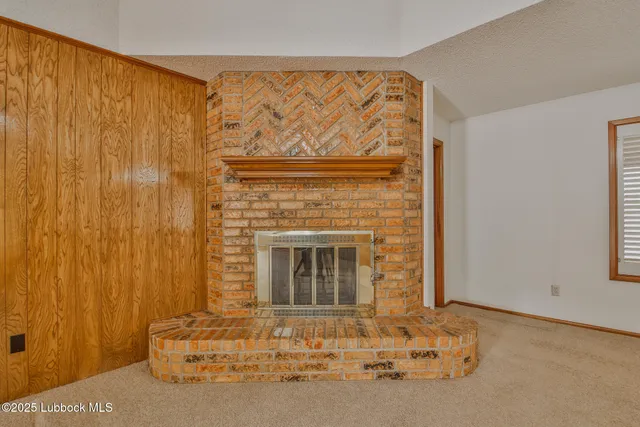 a living room with a fireplace