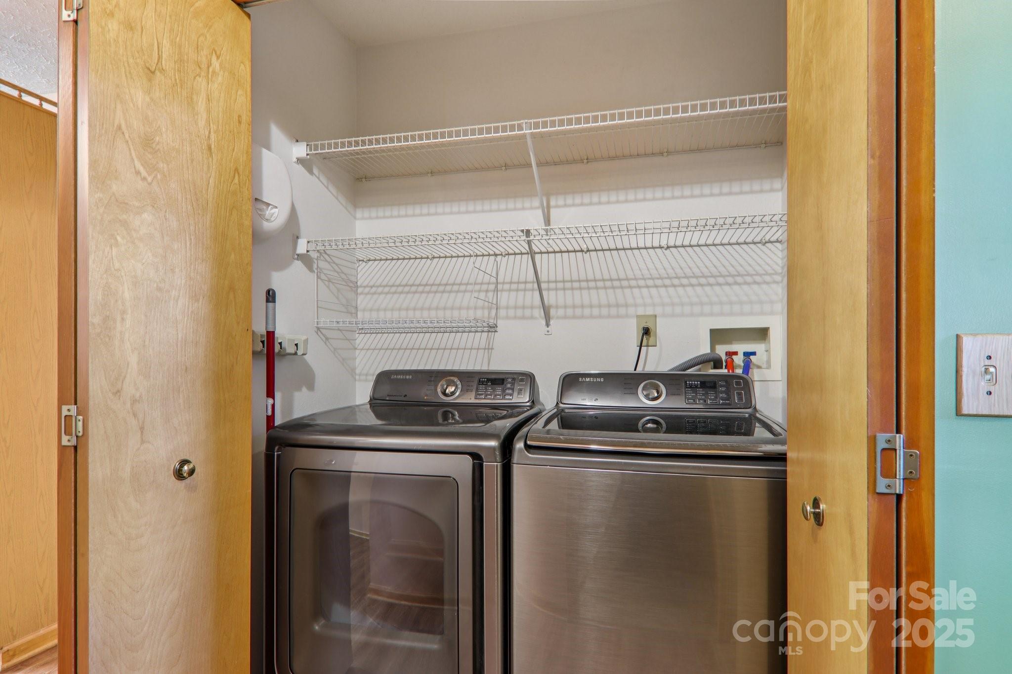 126 Pasco Loop Waynesville, NC 28785 - Photo 17 of 44 a utility room with dryer and washer