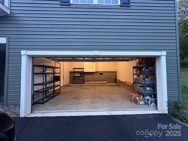 126 Pasco Loop Waynesville, NC 28785 - Photo 34 of 44 a view of a garage and window