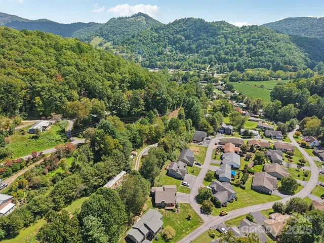 an aerial view of residential house with outdoor space