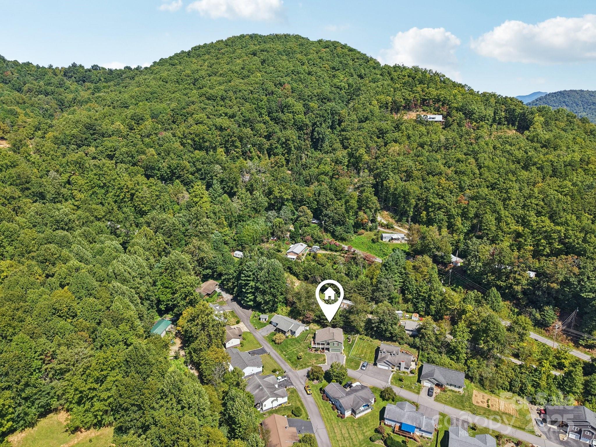 126 Pasco Loop Waynesville, NC 28785 - Photo 39 of 44 an aerial view of a house with a yard