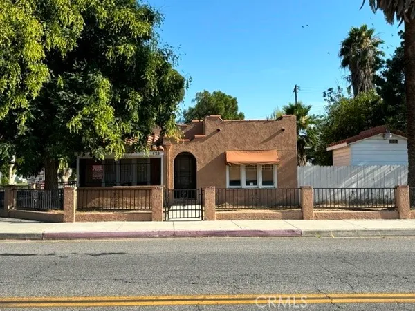 front view of a house with a street