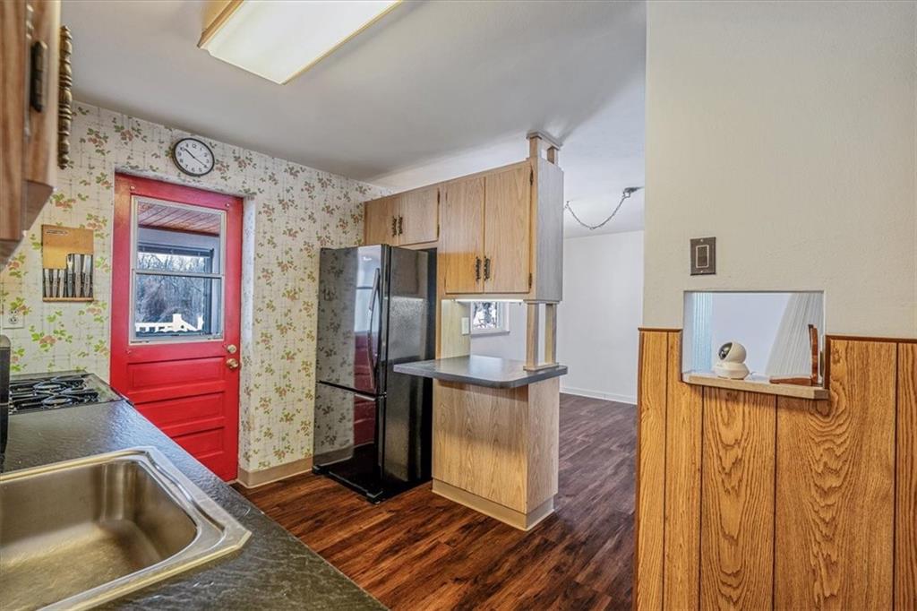 910 Foster Road Clairton, PA 15025 - Photo 17 of 50 a kitchen with stainless steel appliances granite countertop a refrigerator and a stove