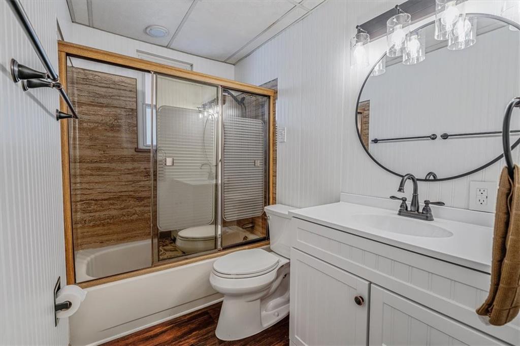 910 Foster Road Clairton, PA 15025 - Photo 19 of 50 a bathroom with a sink toilet and shower