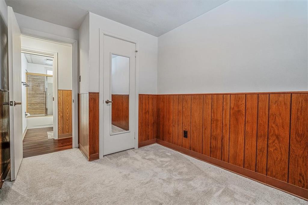 910 Foster Road Clairton, PA 15025 - Photo 29 of 50 an empty room with an entryway door
