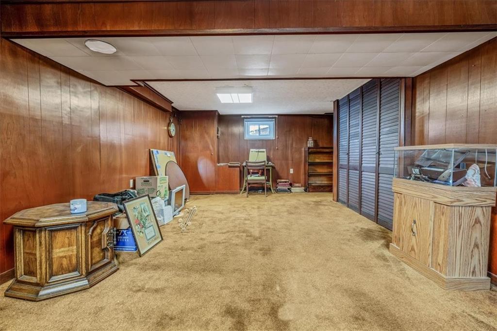910 Foster Road Clairton, PA 15025 - Photo 31 of 50 a view of a hallway with furniture