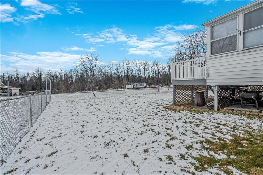 910 Foster Road Clairton, PA 15025 - Photo 43 of 50 a view of a yard with a wooden fence