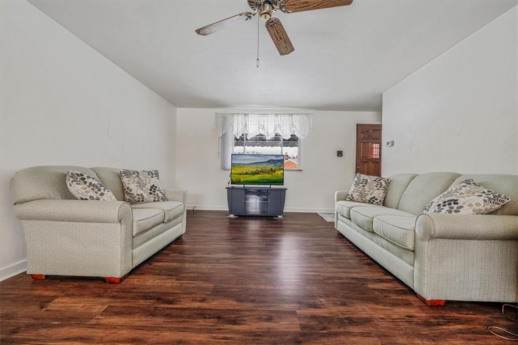 910 Foster Road Clairton, PA 15025 - Photo 6 of 50 a living room with furniture and a wooden floor