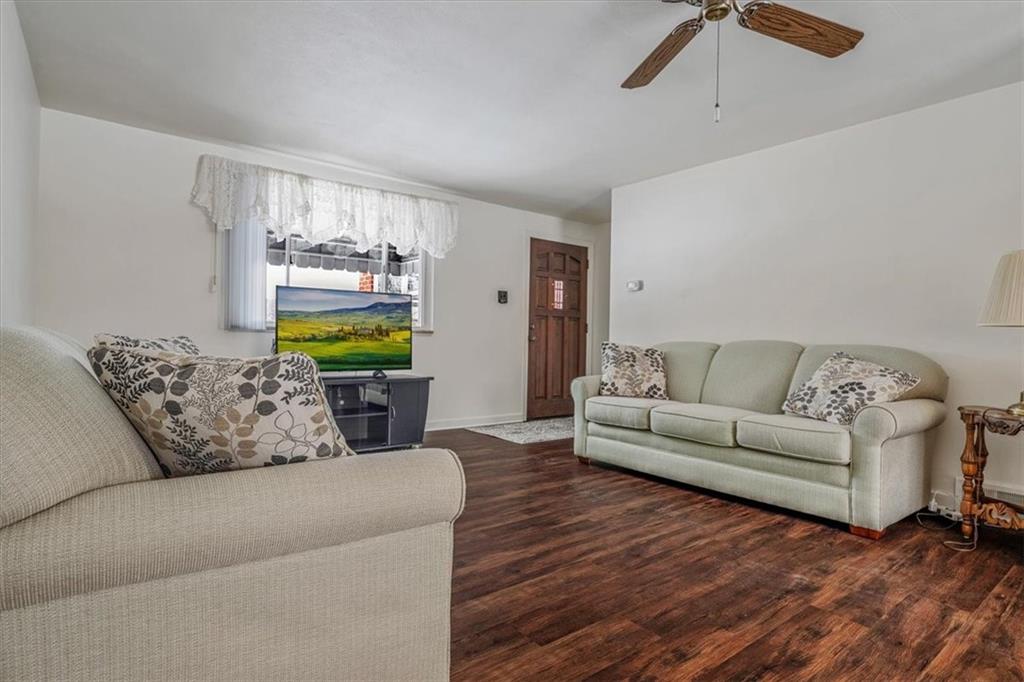 910 Foster Road Clairton, PA 15025 - Photo 7 of 50 a living room with furniture and a wooden floor
