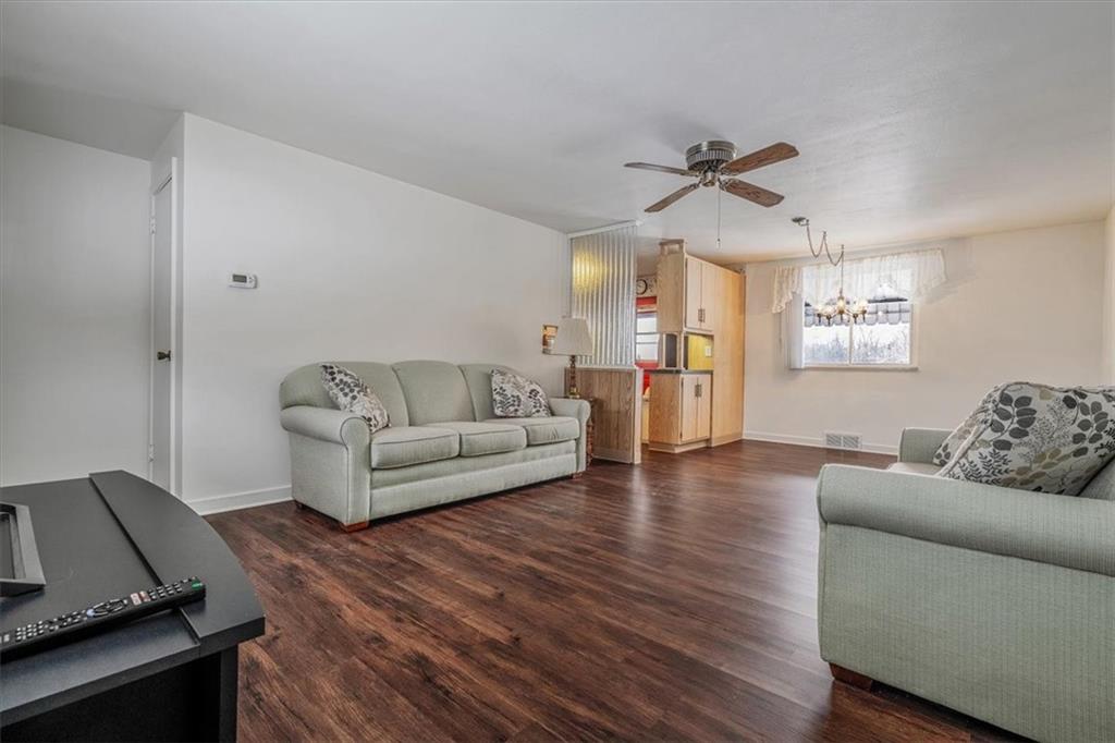 910 Foster Road Clairton, PA 15025 - Photo 9 of 50 a living room with furniture and a wooden floor