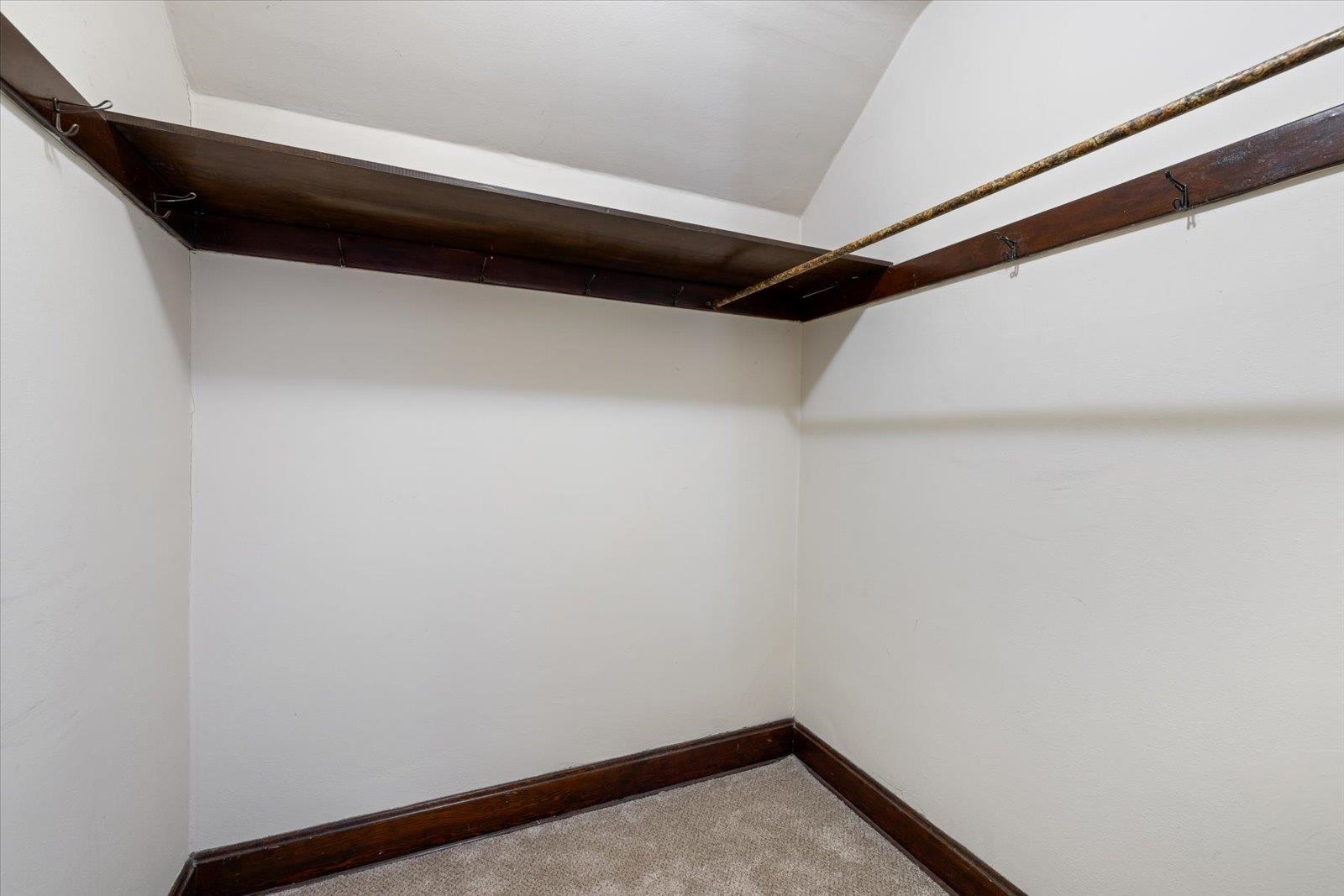3070 Restormel Street Duluth, MN 55806 - Photo 21 of 48 Walk in closet featuring light colored carpet and lofted ceiling