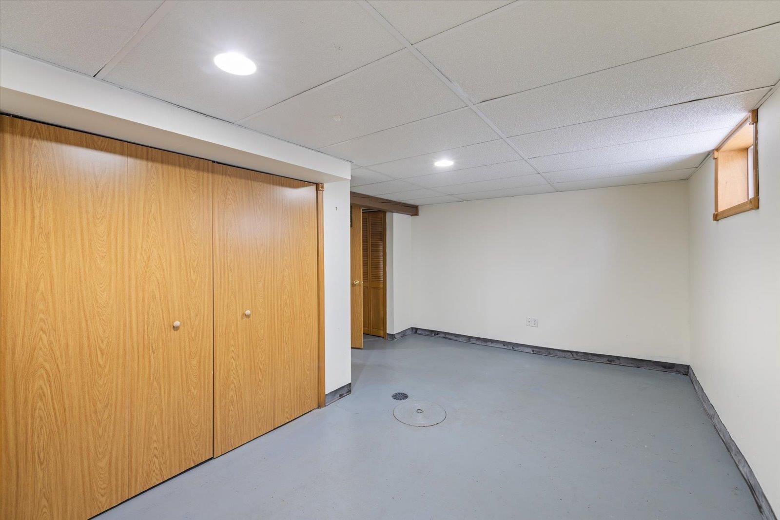 3070 Restormel Street Duluth, MN 55806 - Photo 26 of 48 Finished basement with a paneled ceiling and recessed lighting