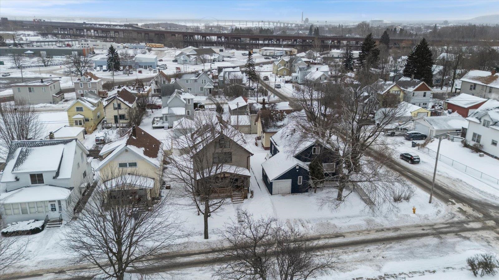 3070 Restormel Street Duluth, MN 55806 - Photo 37 of 48 Snowy aerial view featuring a residential view
