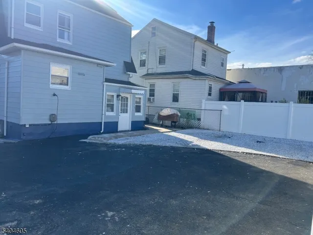 a bathroom with a toilet sink and a mirror