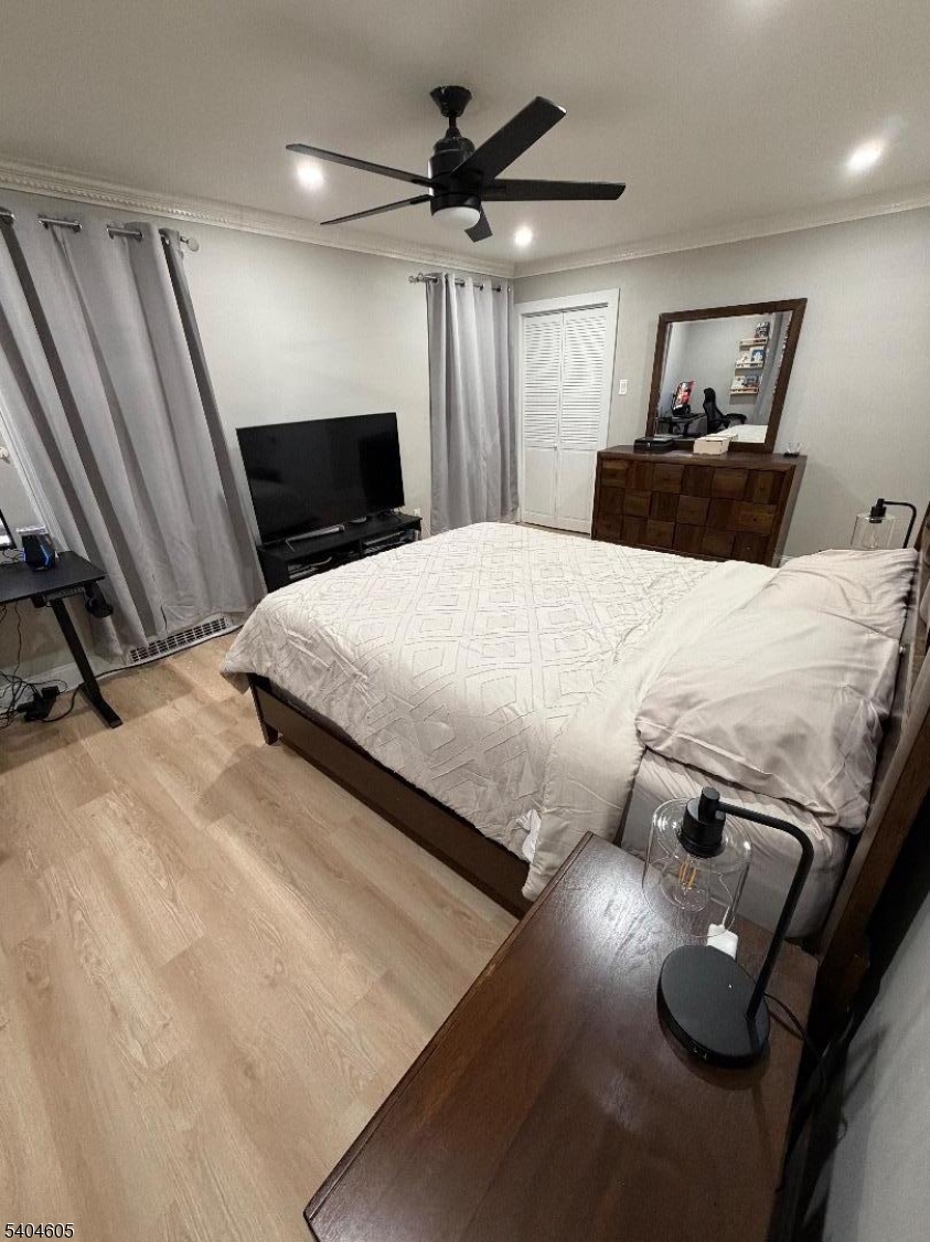 1090 Salem Road Union, NJ 07083 - Photo 37 of 45 a bedroom with a bed and a view of kitchen