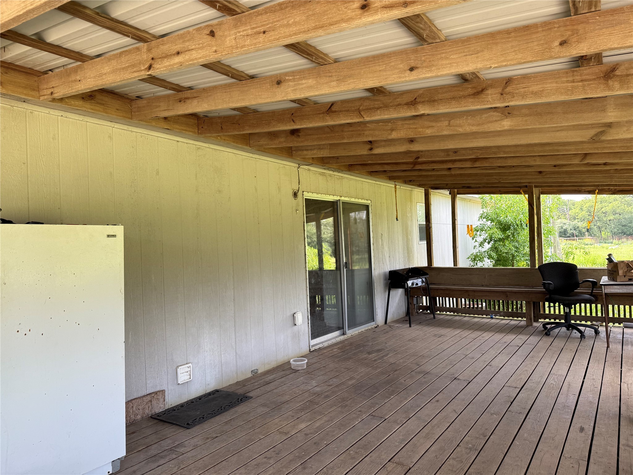 296 County Road 702 Kosse, TX 76653 - Photo 6 of 19 a view of a room with furniture and wooden floor