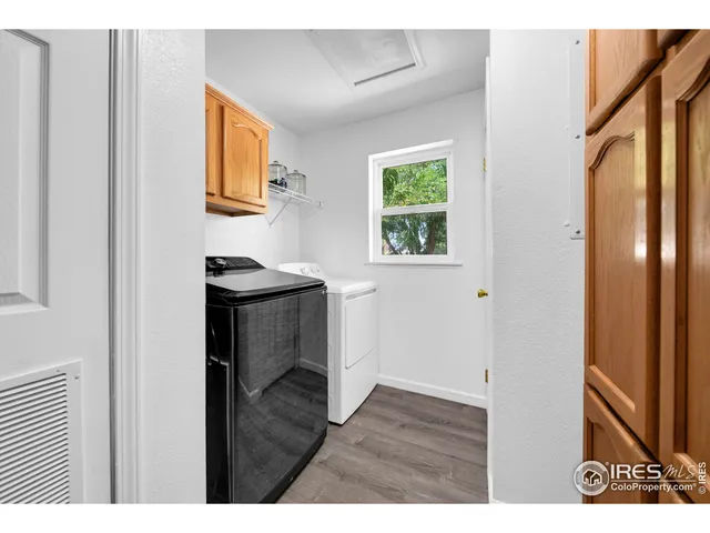 a bedroom with a bed and a potted plant