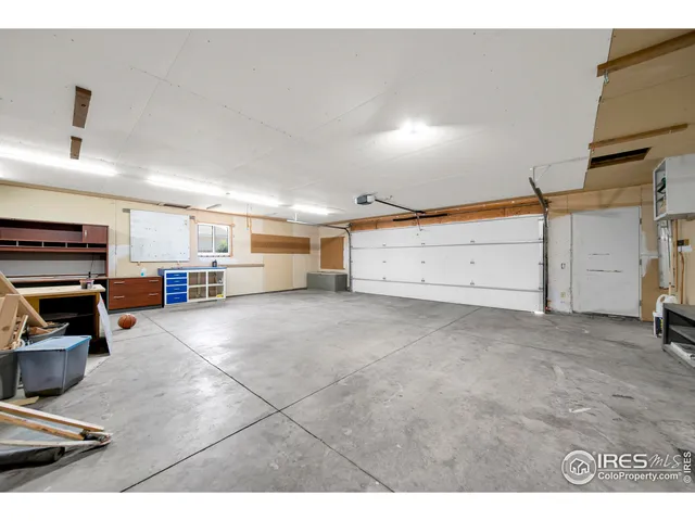 a view of outdoor space with wooden floor
