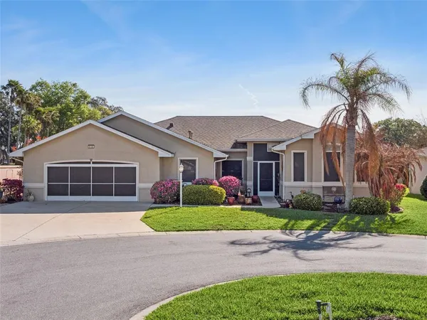 front view of a house and a yard