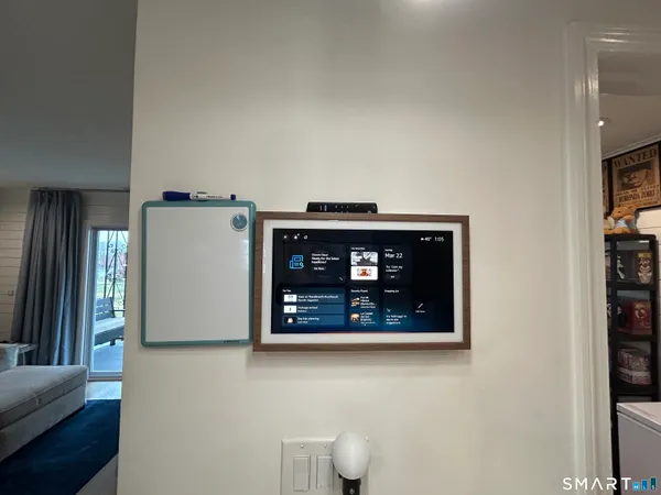 a view of a hallway with washer and dryer