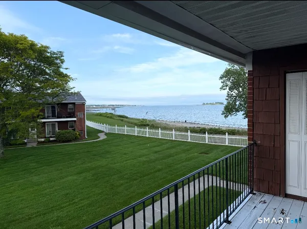 a view of a balcony with a garden