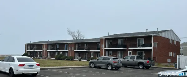 a park view with a table and chairs