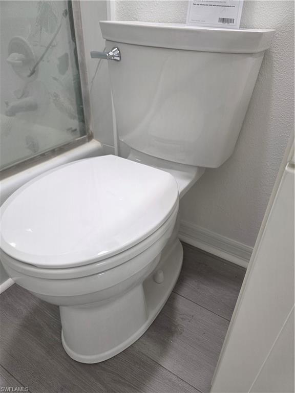 1 Knights Bridge Road, Unit A1 Naples, FL 34112 - Photo 16 of 25 a close view of toilet