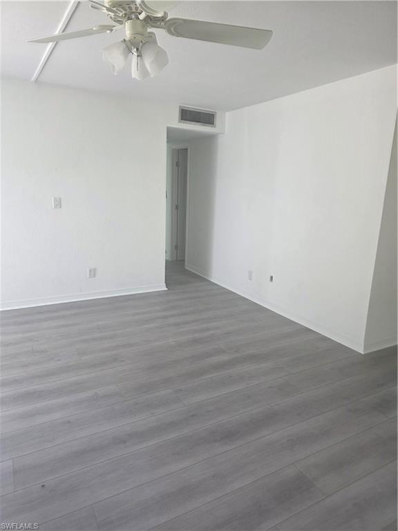 1 Knights Bridge Road, Unit A1 Naples, FL 34112 - Photo 23 of 25 wooden floor in a room