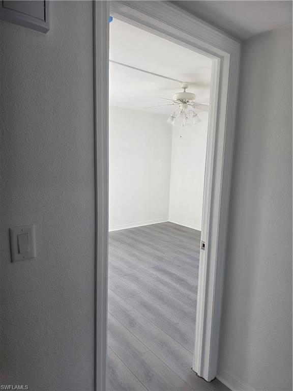 1 Knights Bridge Road, Unit A1 Naples, FL 34112 - Photo 8 of 25 a view of a hallway