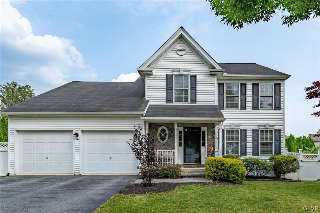 4556 Brighton Road Lower Macungie Township, PA 18062 - Photo 1 of 48 front view of a house with a yard
