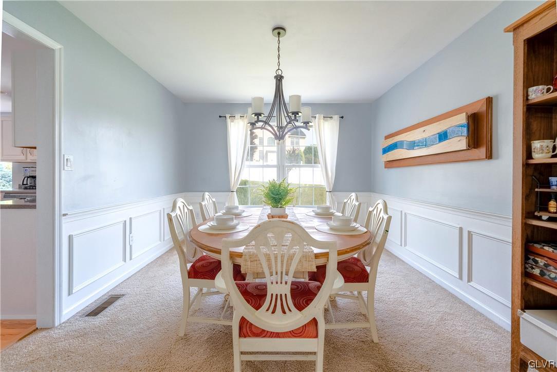4556 Brighton Road Lower Macungie Township, PA 18062 - Photo 18 of 48 a dining room with furniture a chandelier and window