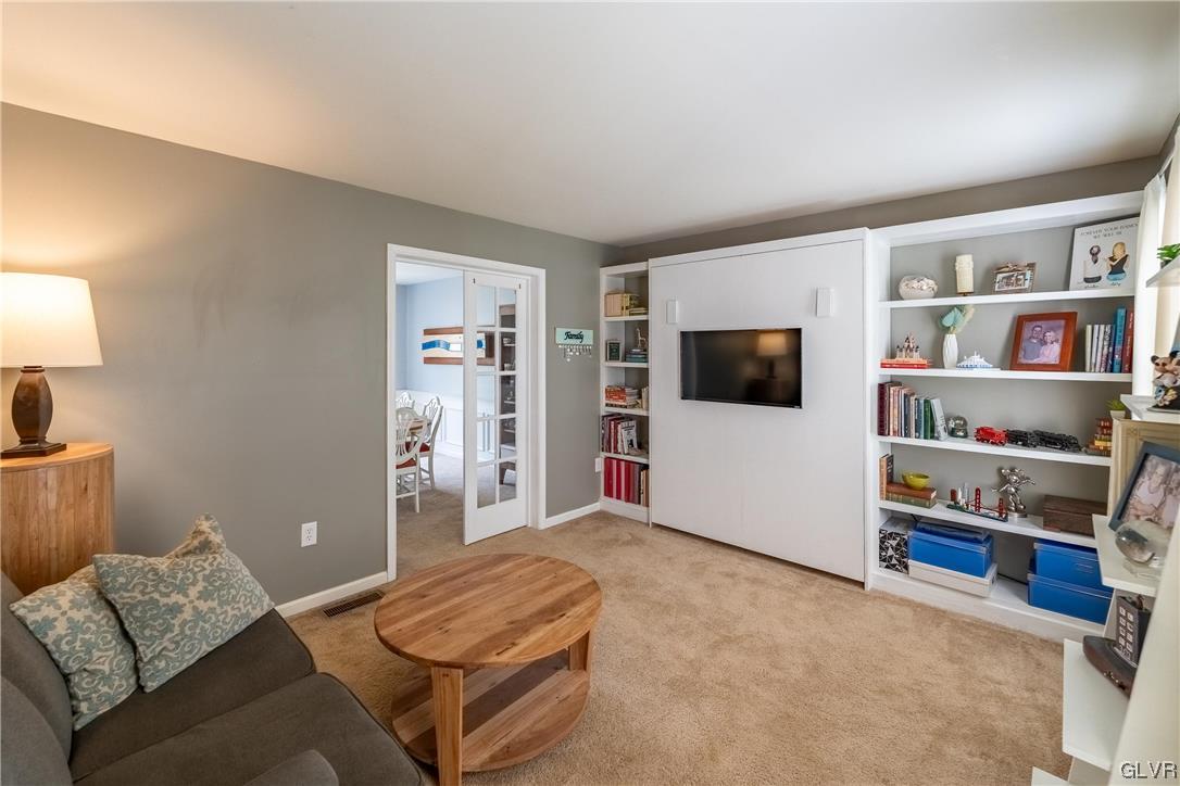 4556 Brighton Road Lower Macungie Township, PA 18062 - Photo 20 of 48 a bedroom with furniture and a flat screen tv
