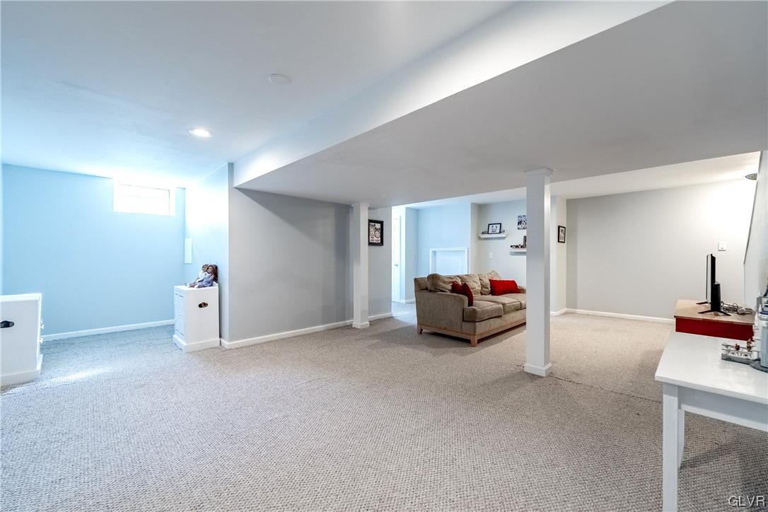 4556 Brighton Road Lower Macungie Township, PA 18062 - Photo 27 of 48 a view of a livingroom with furniture and a couch