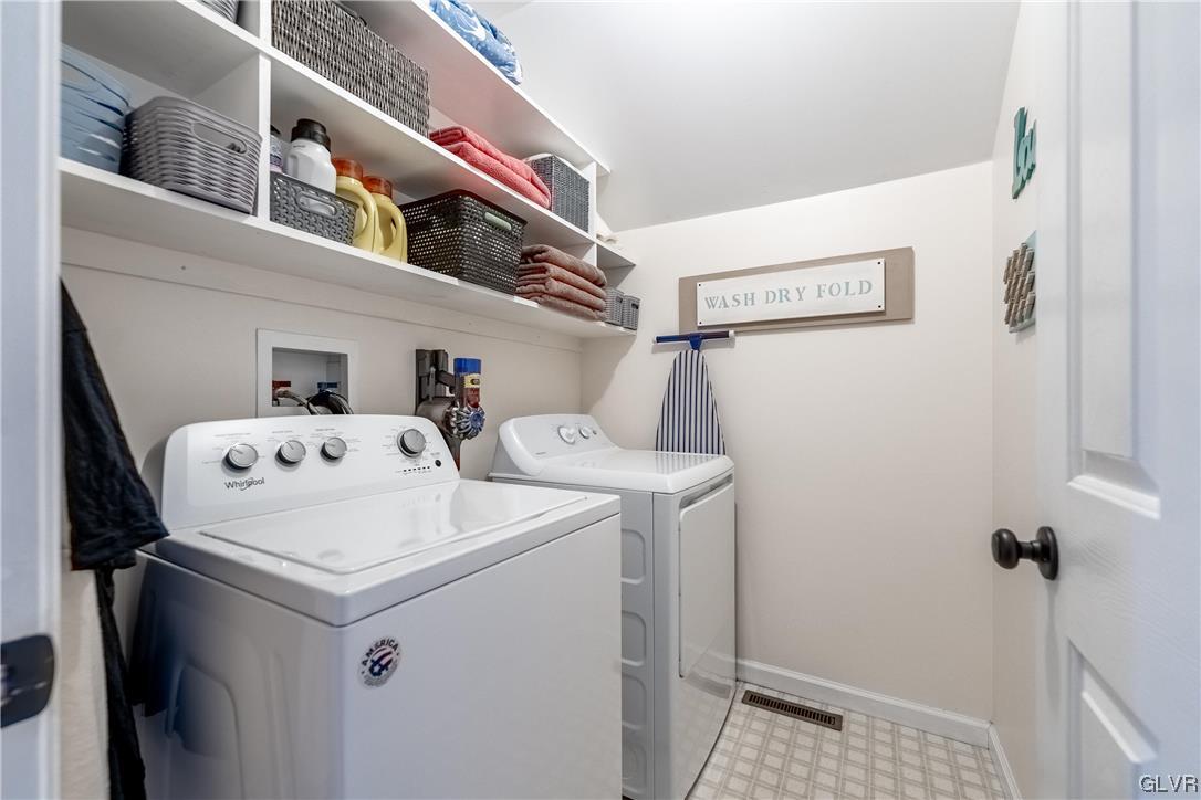 4556 Brighton Road Lower Macungie Township, PA 18062 - Photo 39 of 48 a utility room with dryer and washer