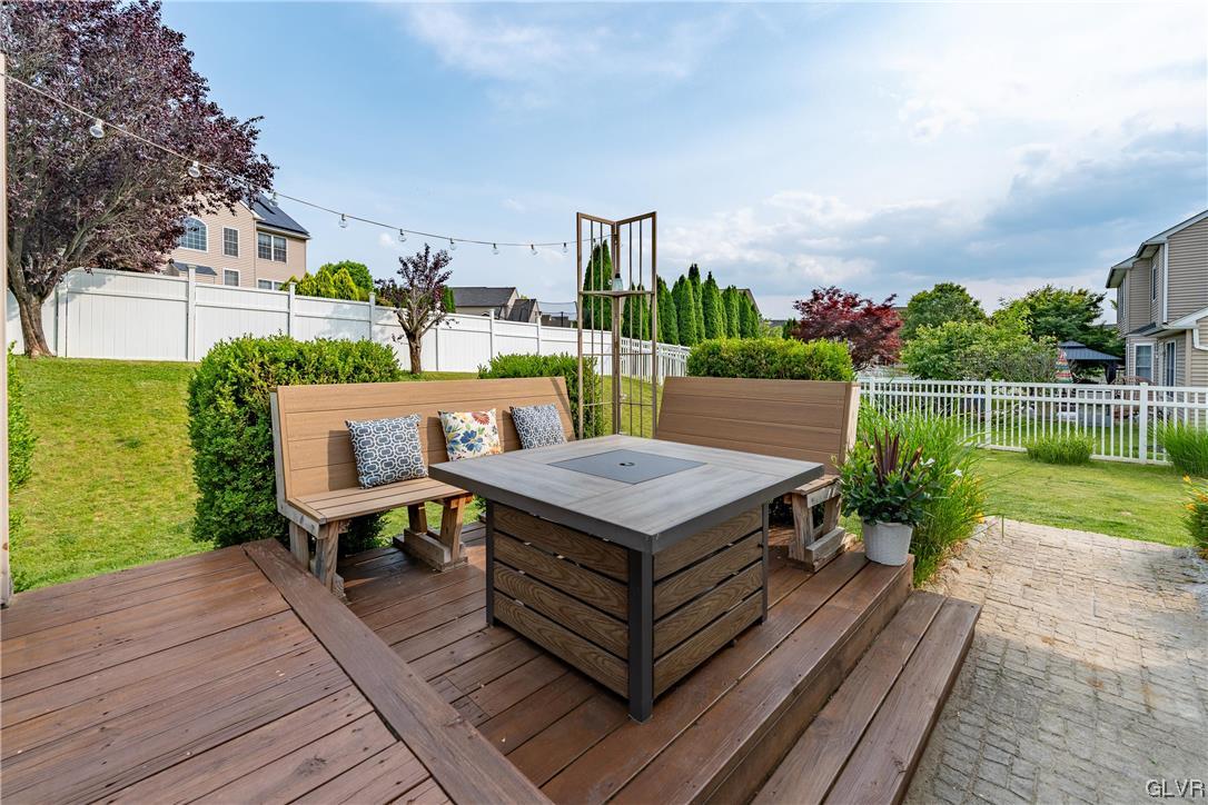 4556 Brighton Road Lower Macungie Township, PA 18062 - Photo 44 of 48 a wooden bench sitting on top of a wooden deck