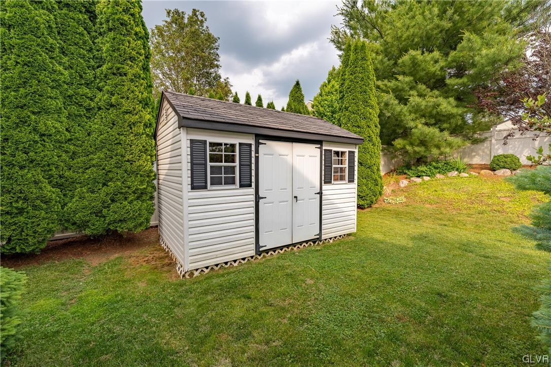 4556 Brighton Road Lower Macungie Township, PA 18062 - Photo 47 of 48 a view of a house with a yard