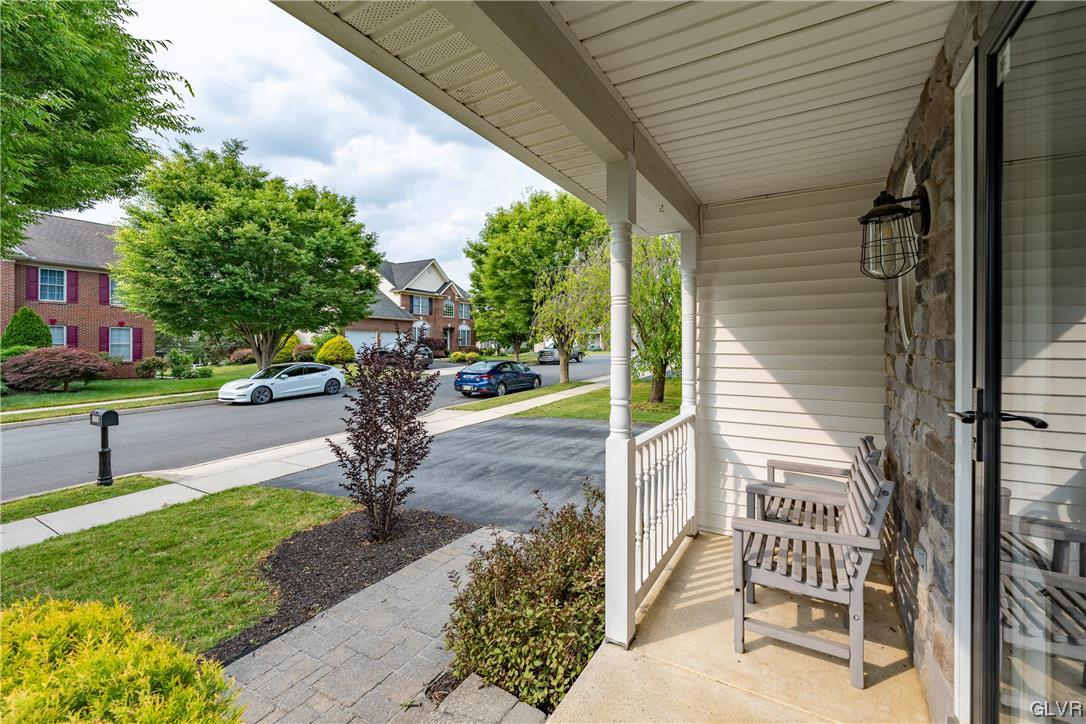 4556 Brighton Road Lower Macungie Township, PA 18062 - Photo 5 of 48 a park view with a bench