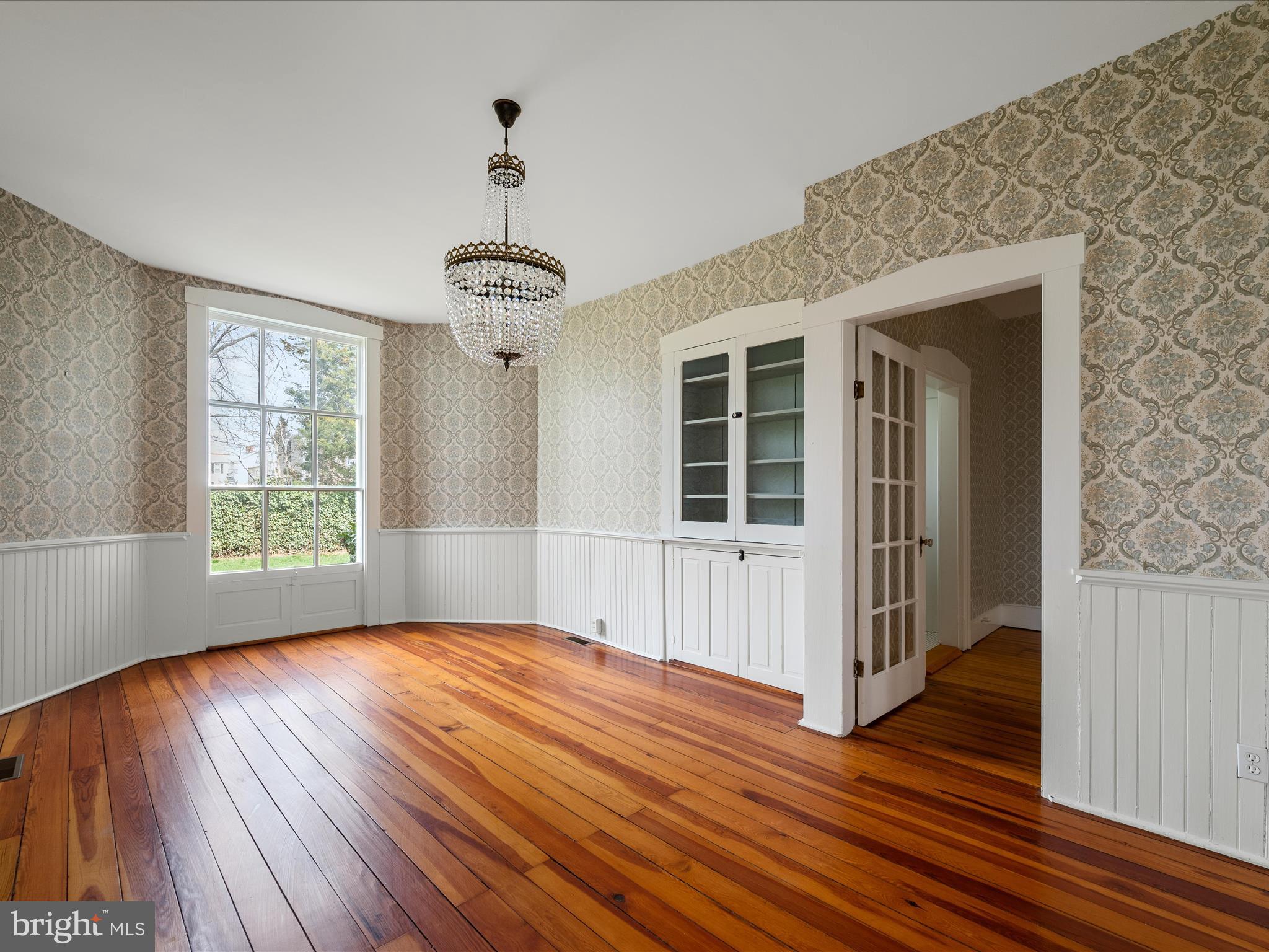 7919 Church Street Middletown, VA 22645 - Photo 14 of 48 a view of empty room with wooden floor and fan